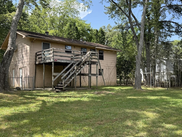 7014 S Dent Rd, Hixson, TN 37343 - rear view of house featuring a wooden deck, stairs, and a yard