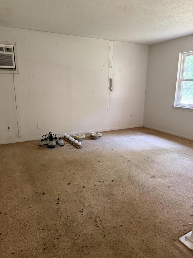 7014 S Dent Rd, Hixson, TN 37343 - empty room with a wall mounted air conditioner and carpet