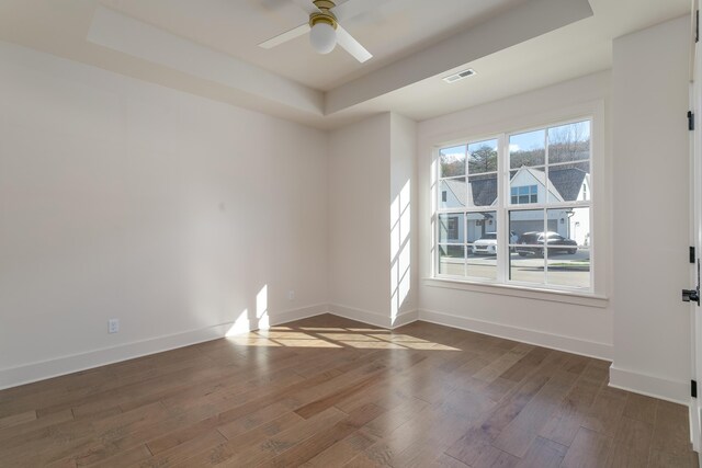 45 Little Sorrel Rd Unit 45, Hixson, TN 37343 - spare room with a tray ceiling, ceiling fan, and wood finished floors