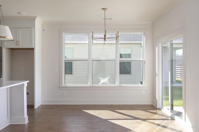 45 Little Sorrel Rd Unit 45, Hixson, TN 37343 - unfurnished dining area featuring wood finished floors, ornamental molding, and a chandelier