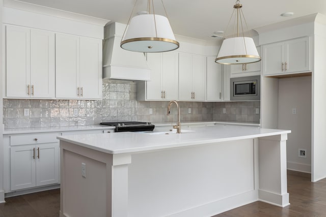 45 Little Sorrel Rd Unit 45, Hixson, TN 37343 - kitchen with stainless steel microwave, custom exhaust hood, a center island with sink, and dark wood finished floors