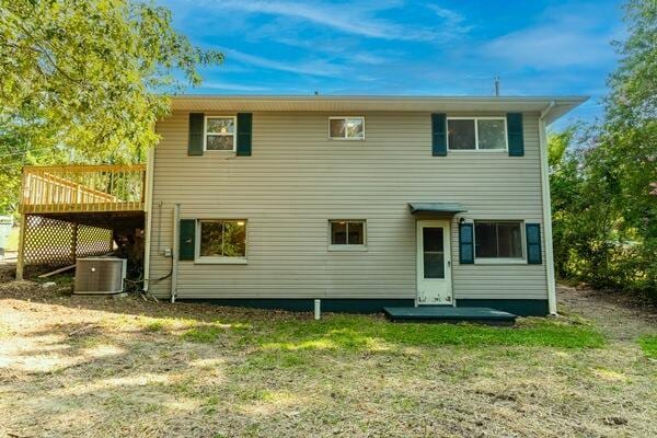 3224 Through St, Chattanooga, TN 37411 - rear view of house with a wooden deck and a lawn