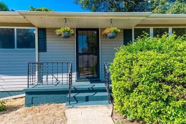 3224 Through St, Chattanooga, TN 37411 - property entrance featuring a porch