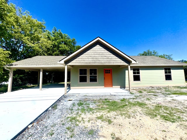 115 Beech St, Rossville, GA 30741 - single story home with an attached carport, driveway, a porch, and a shingled roof