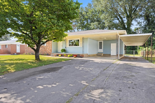 76 Roswell Rd, Rossville, GA 30741 - view of front of property featuring asphalt driveway, an attached carport, and a gate