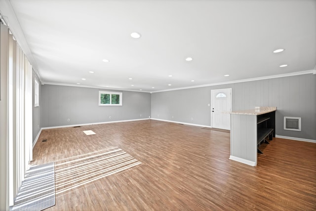 76 Roswell Rd, Rossville, GA 30741 - unfurnished living room featuring crown molding, wood finished floors, and recessed lighting