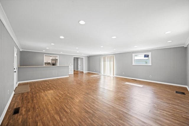76 Roswell Rd, Rossville, GA 30741 - unfurnished living room featuring crown molding, wood finished floors, and recessed lighting
