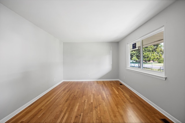 76 Roswell Rd, Rossville, GA 30741 - empty room featuring baseboards and hardwood / wood-style flooring