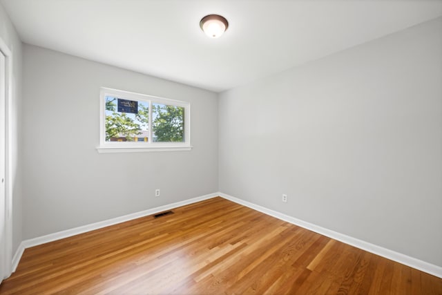 76 Roswell Rd, Rossville, GA 30741 - empty room with baseboards and light wood-type flooring
