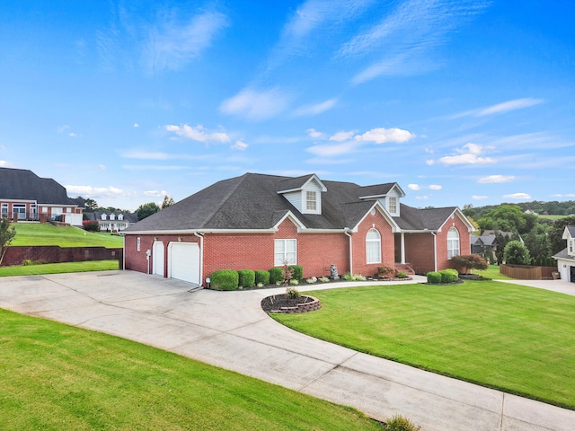 51 Montview Ct, Ringgold, GA 30736 - traditional-style house with brick siding, an attached garage, driveway, a front yard, and roof with shingles