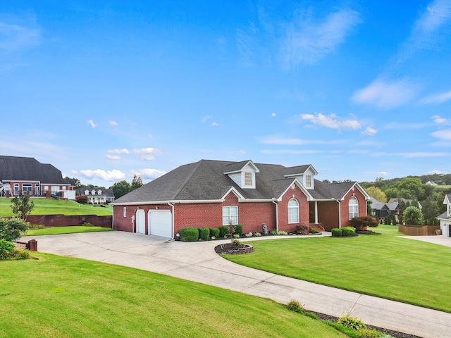 51 Montview Ct, Ringgold, GA 30736 - traditional home featuring an attached garage, brick siding, concrete driveway, a front lawn, and a shingled roof