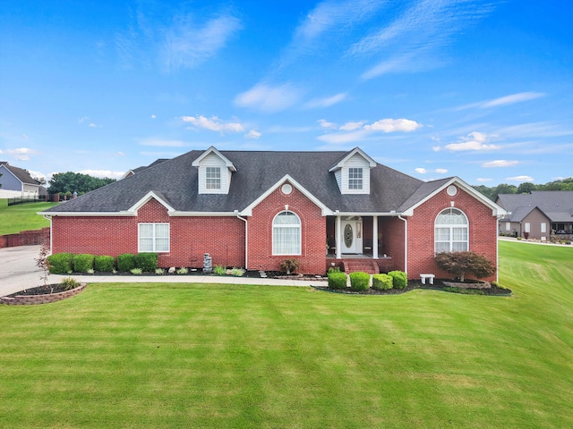 51 Montview Ct, Ringgold, GA 30736 - view of front facade with brick siding, a front yard, and a shingled roof