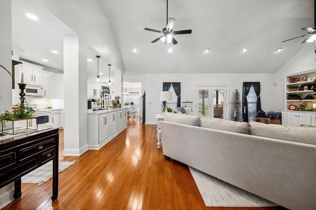 51 Montview Ct, Ringgold, GA 30736 - living room with ceiling fan, high vaulted ceiling, light wood-type flooring, french doors, and recessed lighting