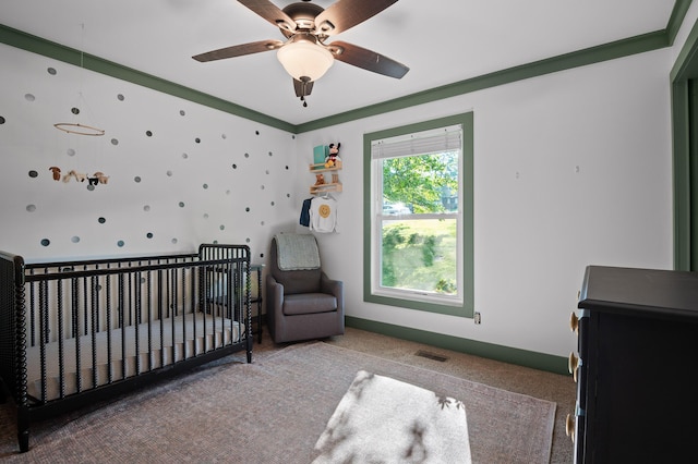 1303 Rockdale Ln, Hixson, TN 37343 - bedroom featuring carpet, a nursery area, and ceiling fan