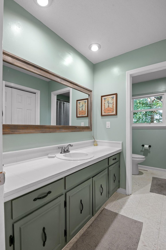 1303 Rockdale Ln, Hixson, TN 37343 - full bath featuring vanity and toilet