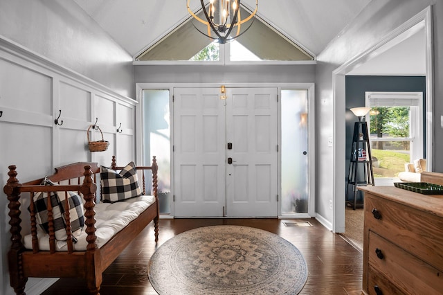 1303 Rockdale Ln, Hixson, TN 37343 - entrance foyer with lofted ceiling, dark wood-style flooring, and a chandelier