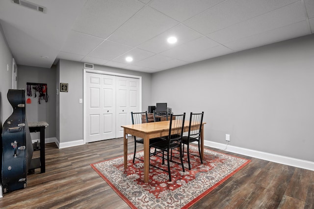1303 Rockdale Ln, Hixson, TN 37343 - dining area featuring dark wood-style flooring, a desk, recessed lighting, and a paneled ceiling