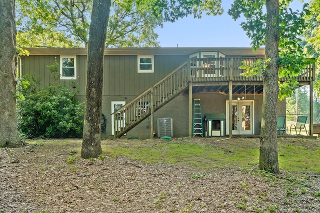 1303 Rockdale Ln, Hixson, TN 37343 - back of property featuring a wooden deck and stairway