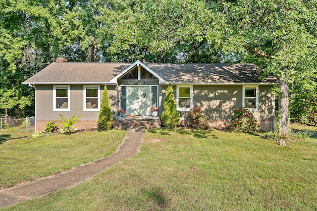 1303 Rockdale Ln, Hixson, TN 37343 - view of front of house with a chimney, a shingled roof, and crawl space