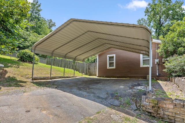 702 Runyan Dr, Chattanooga, TN 37405 - view of parking with a detached carport and asphalt driveway