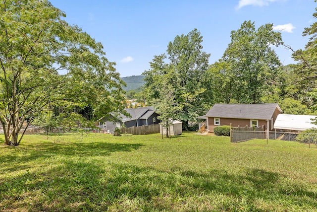 702 Runyan Dr, Chattanooga, TN 37405 - view of yard featuring a shed and a mountain view