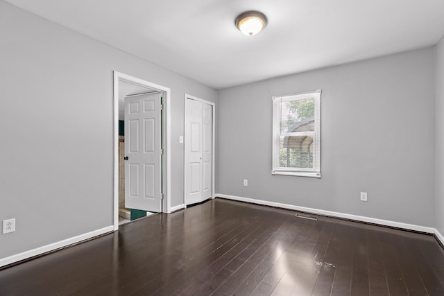 702 Runyan Dr, Chattanooga, TN 37405 - unfurnished bedroom featuring wood finished floors and a closet