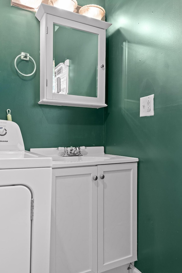 702 Runyan Dr, Chattanooga, TN 37405 - bathroom with washer / clothes dryer and vanity