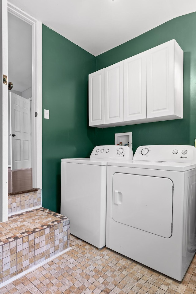 702 Runyan Dr, Chattanooga, TN 37405 - laundry area with cabinet space and washing machine and clothes dryer