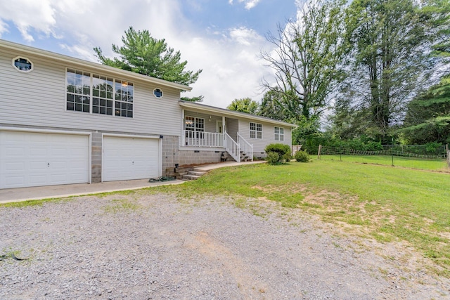515 Choctaw Trl, Chattanooga, TN 37405 - view of front facade with covered porch, a garage, and gravel driveway