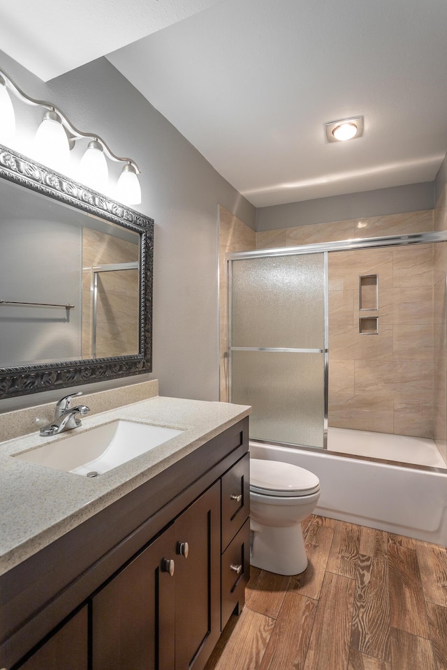 900 Mountain Creek Rd Unit P224, Chattanooga, TN 37405 - bathroom featuring vanity, wood finished floors, and shower / bath combination with glass door