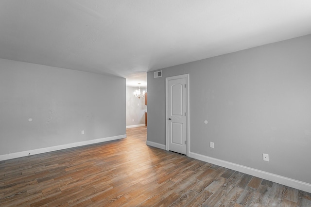 900 Mountain Creek Rd Unit P224, Chattanooga, TN 37405 - spare room featuring a chandelier and wood finished floors
