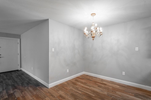900 Mountain Creek Rd Unit P224, Chattanooga, TN 37405 - unfurnished dining area featuring dark wood-style floors and a chandelier