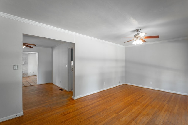 210 Dawn St, Signal Mountain, TN 37377 - spare room featuring ceiling fan, wood-type flooring, and ornamental molding