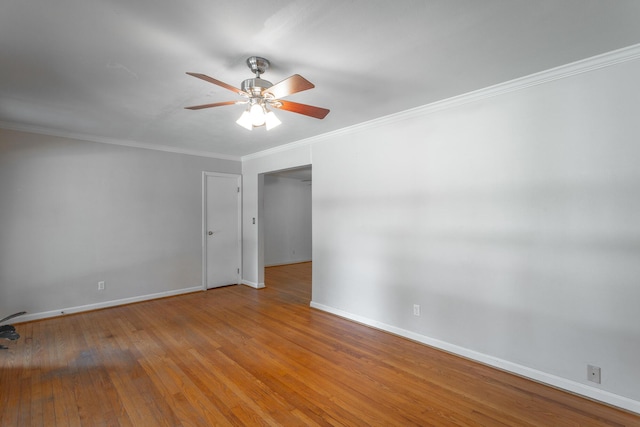 210 Dawn St, Signal Mountain, TN 37377 - spare room with ceiling fan, wood finished floors, and crown molding