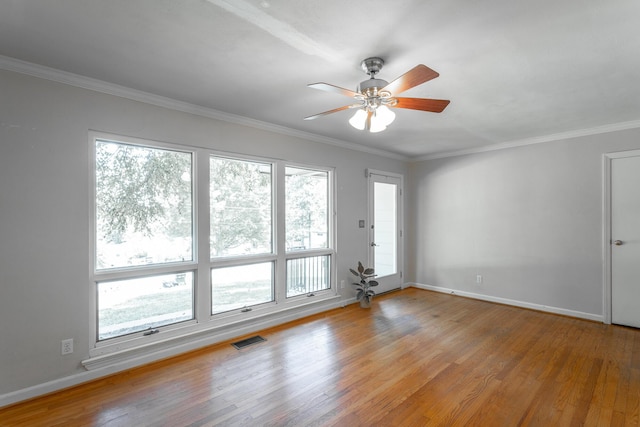 210 Dawn St, Signal Mountain, TN 37377 - unfurnished room with light wood finished floors, a ceiling fan, and crown molding