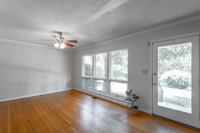 210 Dawn St, Signal Mountain, TN 37377 - spare room featuring a ceiling fan, wood finished floors, and crown molding