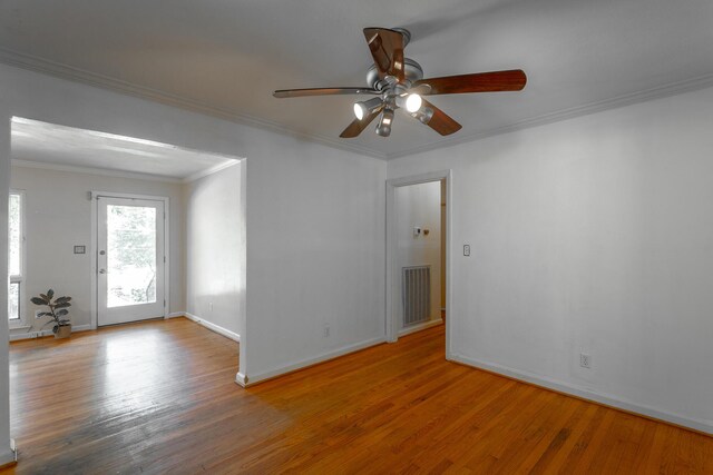 210 Dawn St, Signal Mountain, TN 37377 - spare room with wood finished floors, a ceiling fan, and crown molding