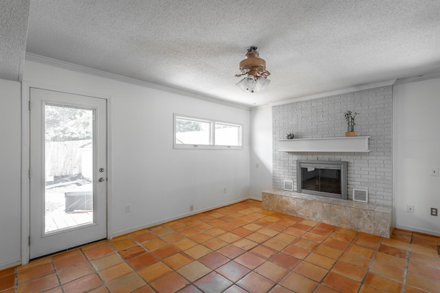 210 Dawn St, Signal Mountain, TN 37377 - unfurnished living room with ornamental molding, a textured ceiling, a ceiling fan, a fireplace, and tile patterned floors