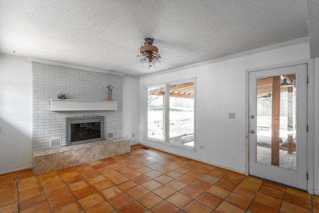 210 Dawn St, Signal Mountain, TN 37377 - unfurnished living room with crown molding, a textured ceiling, ceiling fan, a brick fireplace, and tile patterned floors