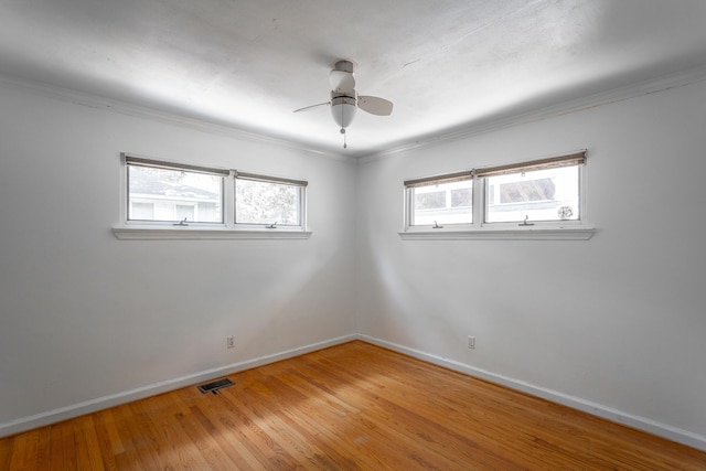 210 Dawn St, Signal Mountain, TN 37377 - spare room with light wood-style flooring, a ceiling fan, and crown molding