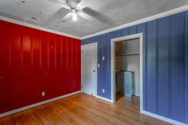 210 Dawn St, Signal Mountain, TN 37377 - unfurnished bedroom featuring wood finished floors, a closet, and ceiling fan