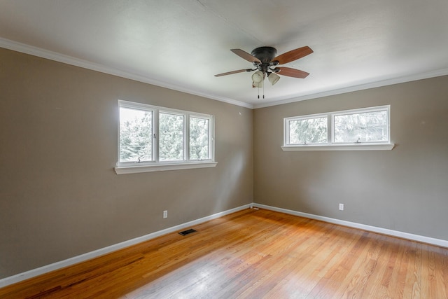 210 Dawn St, Signal Mountain, TN 37377 - spare room featuring a ceiling fan, light wood finished floors, and ornamental molding