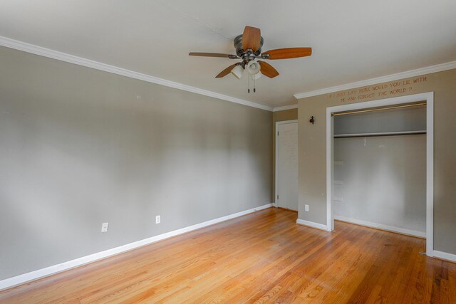 210 Dawn St, Signal Mountain, TN 37377 - unfurnished bedroom with a closet, crown molding, light wood-style floors, and a ceiling fan
