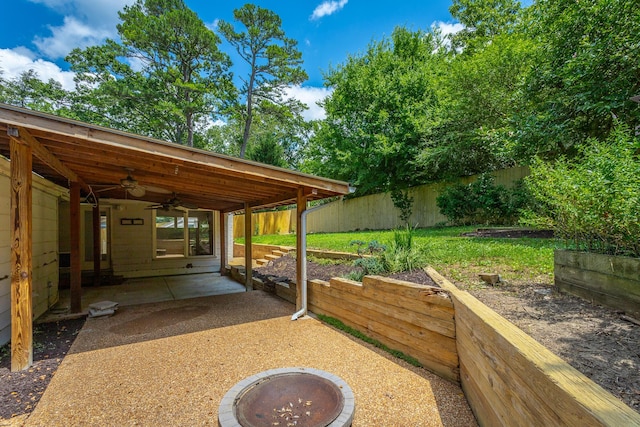 210 Dawn St, Signal Mountain, TN 37377 - fenced backyard with ceiling fan, a patio, and a fire pit