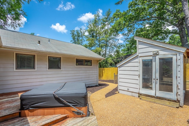 210 Dawn St, Signal Mountain, TN 37377 - wooden deck featuring a hot tub, french doors, and an outdoor structure