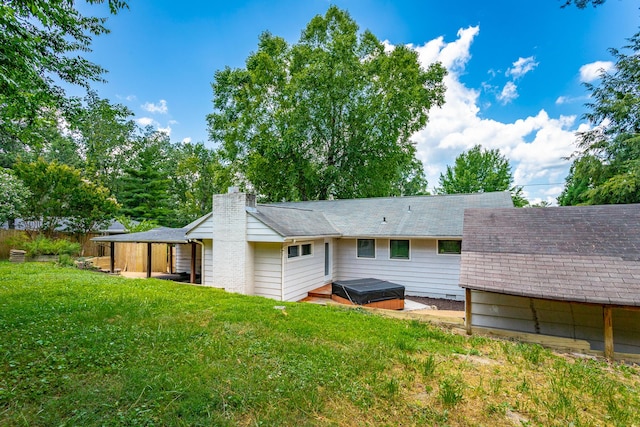 210 Dawn St, Signal Mountain, TN 37377 - back of property with a yard, a chimney, and a shingled roof