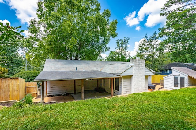 210 Dawn St, Signal Mountain, TN 37377 - rear view of property with a patio area, a chimney, roof with shingles, and french doors