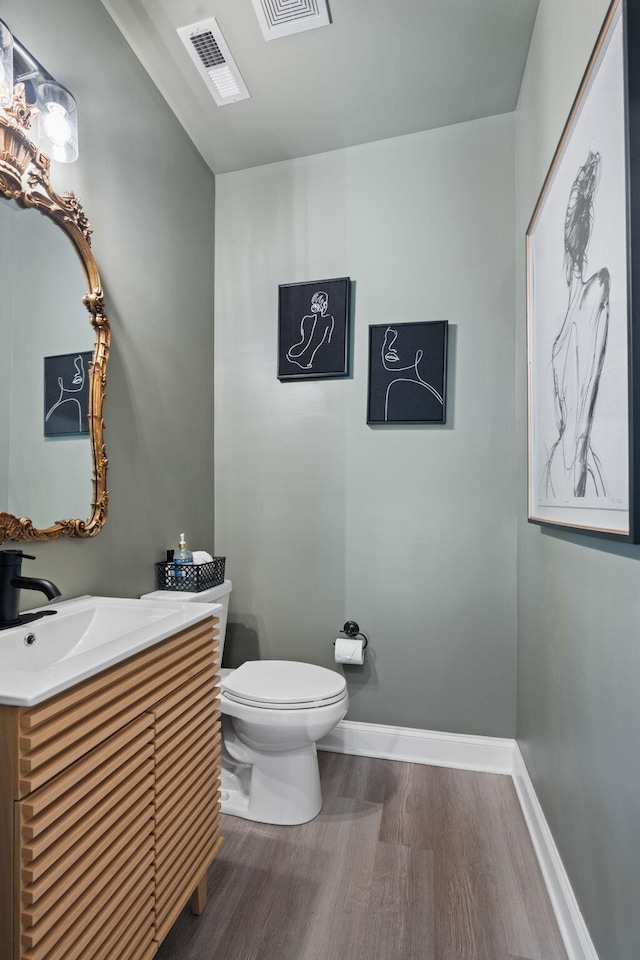 1476 Chatt City Way, Chattanooga, TN 37408 - half bathroom featuring wood finished floors and vanity
