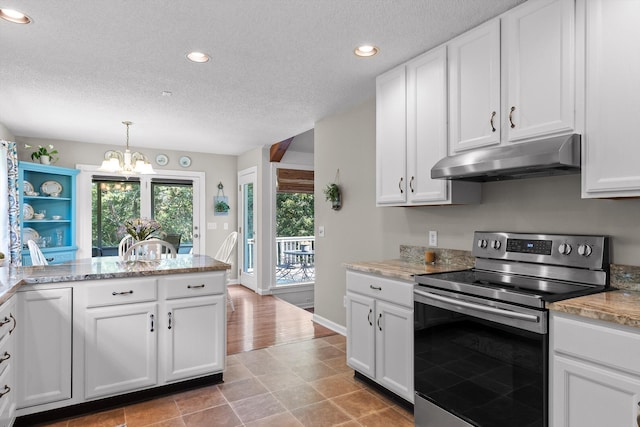 6233 Brenda Ct, Harrison, TN 37341 - kitchen with stainless steel range with electric cooktop, under cabinet range hood, a chandelier, white cabinets, and a textured ceiling