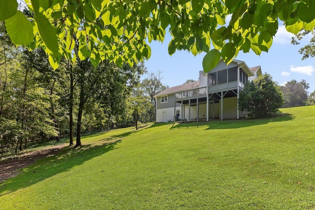 6233 Brenda Ct, Harrison, TN 37341 - view of green lawn featuring a sunroom and a wooden deck